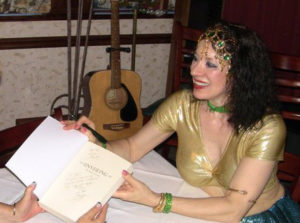 Book signing for the release of Unveiling: The Inner Journey at the Jewels performance in North Virginia, July, 2011. Photo Courtesy Kim M. 